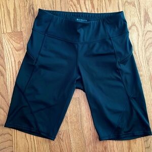 Athleta black bike short, zipper pockets, mesh inset, tall 10” inseam